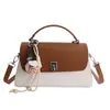 Bolsa Feminina de Nicho de Alto Padrão 2026 Nova Coleção Primavera Estilo Coreano Casual Bolsa Transversal com Cores Contrastantes e Pequena Bolsa de Mão Quadrada Exquisita