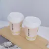 Venta al por mayor de fabricantes Tazas desechables para bebidas calientes de leche de soja, Tazas engrosadas personalizadas con tapas para llevar el desayuno, Empaque para leche de soja y gachas