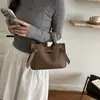 Bolsa de Ombro Transversal Elegante Versátil Simples de Luxo com Padrão Lichia Nova Moda Verão 2026