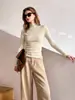 Suéter casual de punto fino de lana pura, sin costuras, lavable a máquina, estilo coreano, para mujer, manga larga, corte ajustado y favorecedor.