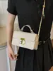 Transfronterizo 2026 Nuevo Verano de Moda Hebilla de Cierre Color Sólido Bordado Acolchado Moda Retro Bolso de Mano Bolso de Hombro Cruzado para Mujer