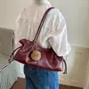 Bolso de hombro minimalista retro europeo y americano, nuevo bolso de mano casual transfronterizo, textura de cuero suave PU, bolso plisado para mujer