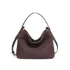 Bolsa de mano plegable de gamuza tejida suave, estilo idéntico al de celebridades, Primavera/Verano 2026, Tote de mano plegable, Bolso para teléfono cruzado de un solo hombro para el commute de mujer