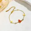 Pulsera Tridimensional de Moda con Diseño Hueco y Pedrería, Accesorio de Moda Popular, Acero de Titanio Chapado Transfronterizo Color Perla Conservación del Color Mariposa Diseño Hueco