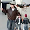 Conjunto de Primavera para Niños Chaqueta de Cuero Falsa de Dos Piezas 2026 Nuevo Elegante Top Infantil para Niños Pequeños Ropa Infantil de Comercio Exterior