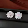 Pendientes de borla con flor de trébol de circonita vintage con un toque de alta gama, pendientes versátiles y de moda al por mayor