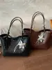 Bolso tote tejido a la moda y con estilo, nueva versión coreana de tendencia 2025, bolso tote vintage, simple y de gran capacidad, bolso de hombro y para el antebrazo