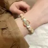 Estilo Xiaohongshu novo estilo chinês pulseira trançada com fecho de segurança 2023 novo cabeça de gato estilo requintado joia de mão para namoradas