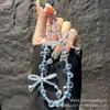 Cadena de Teléfono de Lazo Tridimensional de Perlas Hecho a Mano de Moda y Versátil Correa de Muñeca para Teléfono Llavero Correa