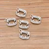 Colgante de aleación con forma de colmillos y dientes de Zakka, estilo retro, de 2 colores, 11 x 16 mm, para hacer tú mismo.