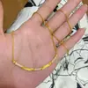 Tienda de Oro Mismo Estilo Collar de Nudo de Bambú Sonrisa Chapado en Oro con Diamantes, Cadena de Clavícula de Lujo Ligero de Alta Gama, Joyería de Cuello Elegante Color Dorado para Mujeres