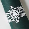Anillo de servilleta con copo de nieve blanco navideño de comercio exterior, hebilla de servilleta para bufanda de hotel de restaurante occidental, venta al por mayor al contado de Zhejiang