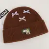 Gorro de punto estilo coreano, mezcla de lana, inspirado en la dopamina, con un lazo, diseñado para mujeres, que proporciona calidez y protección para los oídos en otoño e invierno, adecuado para estudiantes