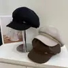 Al por mayor Coreano 2026 Otoño/Invierno Nuevo Francés Elegante Insignia Metálica Octagonal Sombrero de Mujer Casual Adelgazante Gorra de Boina