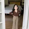 Tops y Camisetas Súper Elegantes y Atractivos para Niñas Sin Etiquetas en el Cuello, Pantalones de Campana Rayados Elásticos, Nueva Colección Otoño 2026