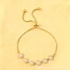 Cdd Nuevo Cobre Incrustado Circonio Lujo Accesible Gama Alta Calado Trébol de Cuatro Hojas Elegante Pulsera Ajustable Deslizante Fábrica de Origen