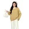 Ropa de maternidad otoño e invierno nuevo suéter de cuello de color block holgado que cubre el vientre cúrcuma negro estilo perezoso top de punto pieza única