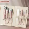 Kit de aço inoxidável para arte de unhas transfronteiriço com 10 peças: lixa de unha, tesoura de sobrancelha, limpador de ouvido, pinça para sulco da unha, cortador de unha do pé