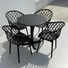 Juego pequeño de mesa y sillas redondas de acero al carbono simple para ocio en balcón, mesa de discusión, área de descanso, mesa de comedor para cafetería de té con leche al aire libre
