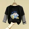 Camiseta de manga larga de algodón puro para niño 2026 primavera y otoño nueva elegante de dibujos animados estilo dos piezas falsas camiseta base de primavera para niño