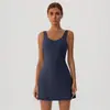 Falda de tenis sin costuras transfronteriza con espalda en U para mujer con almohadillas en el pecho y shorts incorporados, secado rápido, anti-exposición, falda deportiva de golf estilo europeo y americano