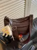 Bolso de mano para mujer transfronterizo, bolso de mamá para mujer de mediana edad, nuevo estilo 2026, gran capacidad, bolso de hombro simple, bolso cruzado de alta gama, moderno