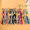 Cuerda tejida a mano muy atractiva con colores contrastantes, llavero con cordón, funda de teléfono DIY, correa de muñeca portátil, accesorios de material para hacer cuentas