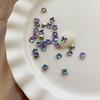 Explosiones Diamante de cristal para uñas de 5 mm Decoraciones para uñas de mariposa Nuevo taladro de fondo puntiagudo rojo neto Diamantes de imitación de color mágico transparente