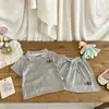 Conjunto de Dos Piezas para Niña de Verano 2026, Nuevo y Elegante, con Cuello Polo, Lindo Top de Manga Corta y Shorts/Falda, de Moda