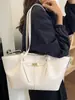Bolso de hombro vintage de gran capacidad, modelo nuevo 2026 para mujer, tipo bandolera con textura casual para el trabajo o la escuela, adecuado para estudiantes universitarios