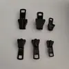 Ykk Genuino No. 3, No. 5, No. 8, No. 10 Tiradores de Cremallera de Resina con Cierre Automático Tirador de Cremallera de Bolsillo Tirador de Cremallera Antideslizante