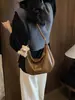 Bolso de mano simple estilo coreano para dumplings, nuevo bolso de axila de alta calidad con textura de Henggeng, bolso de hombro y bandolera elegante y versátil