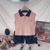 Polo sin mangas de verano para niños y niñas 2026 Nuevo traje de dos piezas de color liso para niños, casual, estilo preppy
