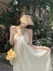 Vestido Largo Sexy Estilo Puro Deseo Espalda Descubierta Tirante Halter Sin Mangas Verano Playa Chic Color Sólido Falda Larga Mujer ins