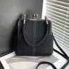 Bolso de mano de gamuza con diseño de nicho para comercio exterior para mujer, nuevo bolso retro con clip para teléfono, bolso de hombro cruzado versátil, moderno