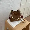 Bolsas vintage de nicho Shuai Mi Jia outono 2026 nova bolsa feminina popular bolsa transversal bolsa de balde trançada da moda