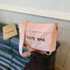Bolsa de Tela Lavable Versátil de Gran Capacidad para el Verano 2026 Nuevo Elegante Letra Alto Grado Mamá Bolso Tote Hombro