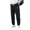 Calças casuais masculinas de veludo cotelê grosso com forro de fleece para outono e inverno, calças jogger quentes e versáteis