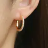 Pendientes de Color Oro 18K Chapados en Cobre de Venta Caliente Transfronterizos con Anillo de Oreja de Circonita Pendientes Exquisitos de Moda Minimalistas Versátiles