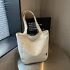 Outono de 2026 Novo Estilo Coreano Moda Estrela Lantejoula Grande Capacidade Nicho Portátil Simples Versátil Bolsa de Ombro de Mão
