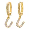 Brincos de 26 letras banhados a ouro com zircônia da Europa e dos Estados Unidos Brincos de nicho de alto padrão Clipe de orelha requintado Argola de orelha com temperamento Fivela de orelha atacado