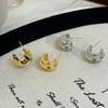 Pendientes irregulares dorados de doble tubo con diseño de nicho simple estilo Hong Kong para mujer, con personalidad diaria, a la moda, combinables con todo.
