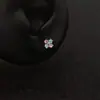 Arete de titanio con flor cruzada azul y rosa transfronterizo para el lóbulo de la oreja para hombres, impresionantes aretes versátiles con colgante de estrella para mujeres