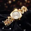 Novo relógio feminino de luxo, nicho, cravejado de diamantes com algarismos arábicos, movimento a quartzo e um design de pulseira de alta qualidade - um acessório de pulso moderno para mulheres