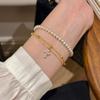 Pulsera Cruz Doble Capa Retro de Lujo Ligero Moda Diseño con Circonias Incrustadas Sentido del Diseño Nuevo de Alta Gama Versátil Pulsera de Moda