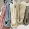 Calcetines de felpa para otoño e invierno para mujer, cálidos, calcetines japoneses de media pantorrilla, engrosados, color liso, calcetines de felpa de raya fina, venta al por mayor, calcetines Zhuji