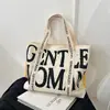 Bolsa Tote de Lona com Letras de Grande Capacidade Casual para Mulheres, Nova Moda de Inverno Versátil para Ombro, Bolsa de Mão para o Dia a Dia