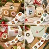 Um conjunto de adesivos de Natal com grafite de desenho animado de 500 peças transfronteiriço, etiquetas adesivas de 2,5 cm para decoração de presentes de desenho animado