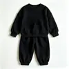 Comércio Exterior Simples Conjunto de Moletom com Capuz e Calça Jogger Cor Sólida Infantil Meninos Meninas Calça Jogger Solta com Punho Conjunto de Duas Peças Roupas Infantis de Outono Fonte Atacadista