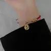 Piedra ojo de gato placa dorada de la suerte este año cuentas de buena suerte cuerda roja tejida pulsera de la paz regalo de nicho cuerda para la mano hombres y mujeres